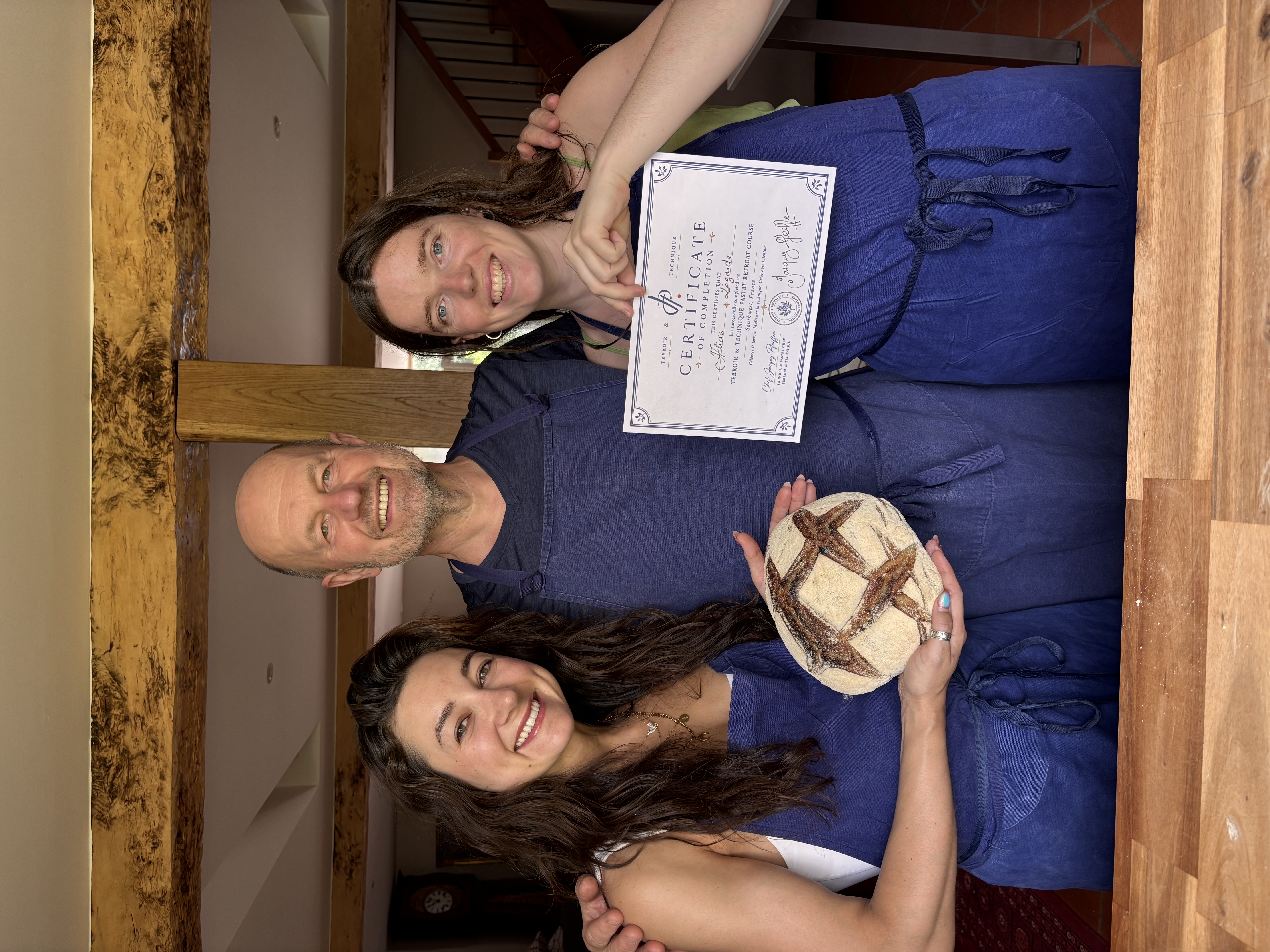 Chef Jacquy Pfeiffer presenting Certificate of Completion and artisanal bread