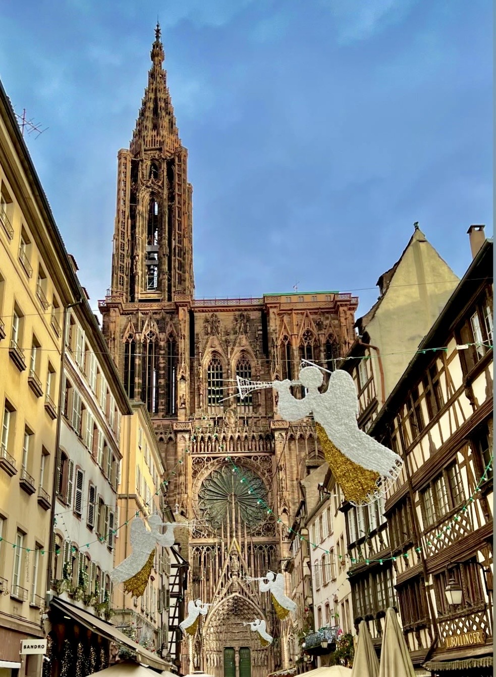 Strasbourg Cathedral framed by traditional historic architecture