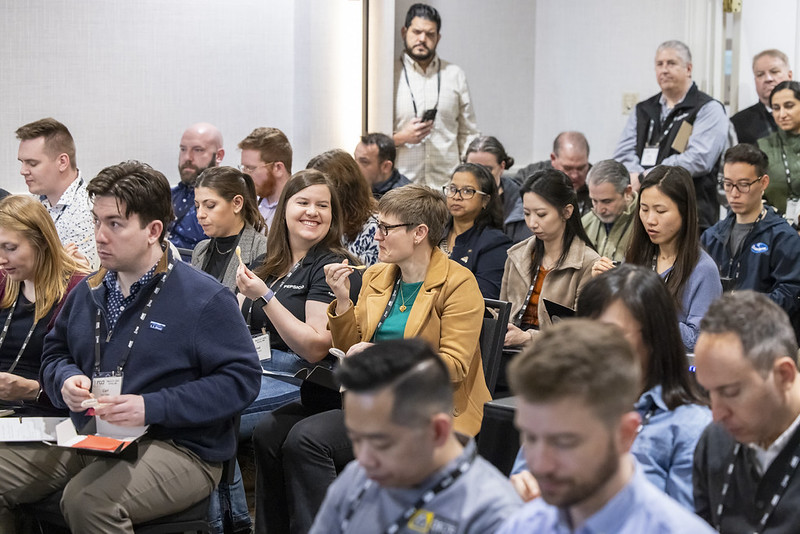 RCA professionals engaged in culinary discussion