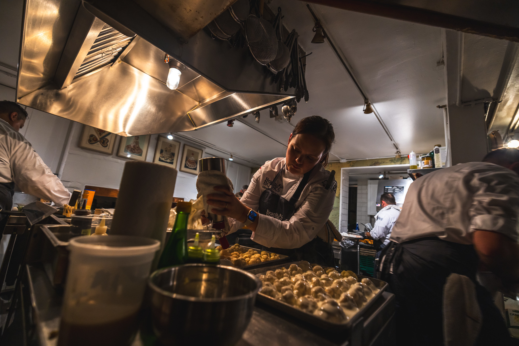 Chef professionals collaborating in a kitchen setting